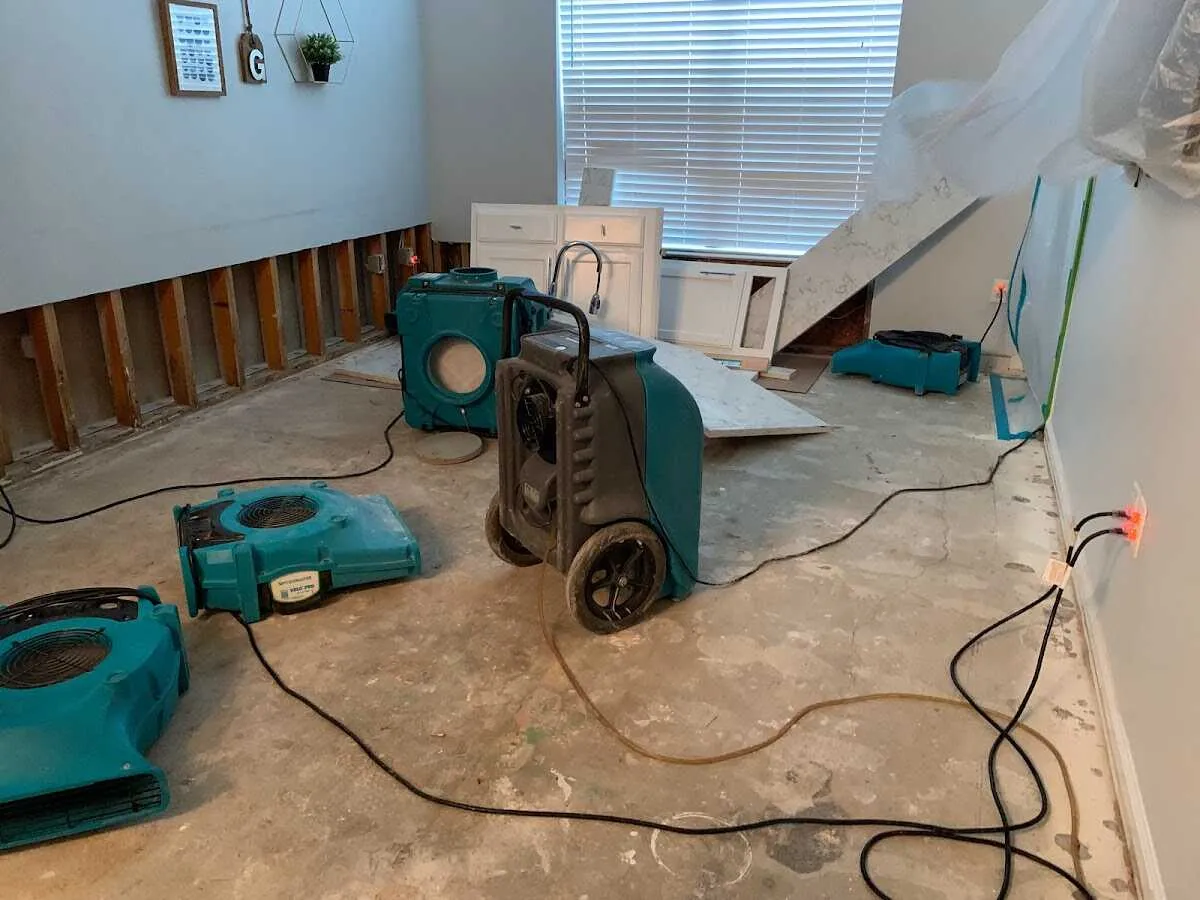 Dehumidifier in flood-cut room for Water Damage Restoration in Delmar